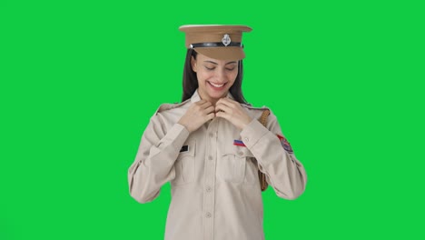 Happy-Indian-female-police-constable-wearing-hat-Green-screen