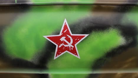 red star on camouflage pattern