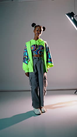 fashionable woman in neon green jacket and cargo pants