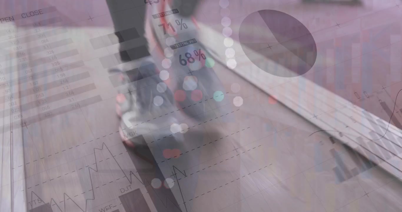 Animation of graphs and financial data over feet of woman walking on treadmill