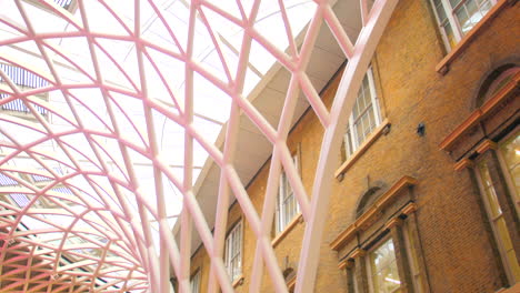 Looking Up Into The Roof Of King's Cross Station With Modern Interior In London, United Kingdom