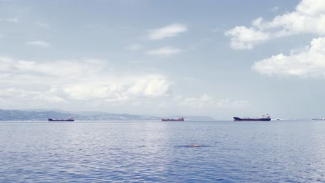 commercial ships sailing in the bosphorus.