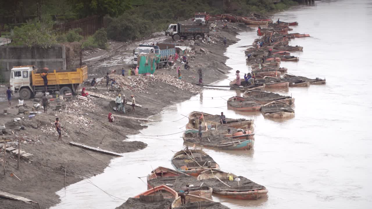 Manual Sand Extraction Operations on a River
