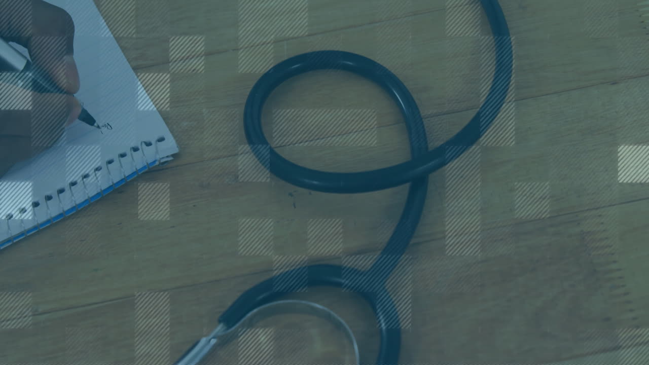 On wooden surface, stethoscope and notepad with grid pattern animation overlay