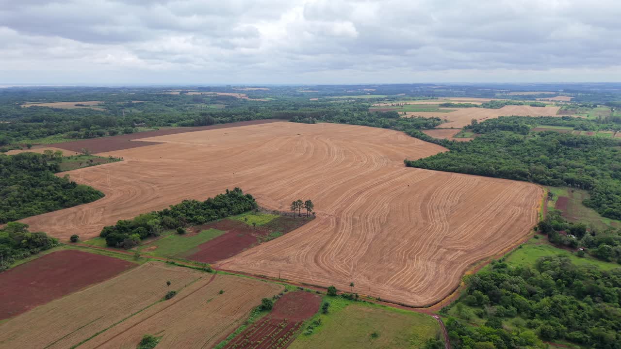 Aerial landscape of cultivated fields and woodland patches in Campichuelo, Paraguay, sustainability and agriculture
