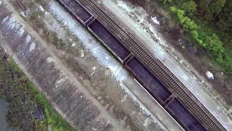 aerial view of train cars on railroad tracks