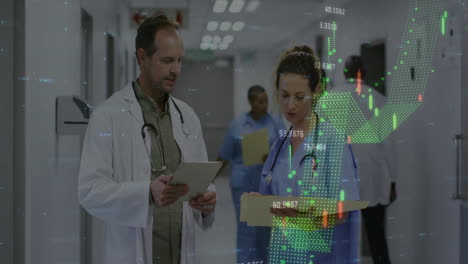 Animation-of-graphs,-changing-numbers-over-caucasian-doctor-standing-and-discussing-patient-reports