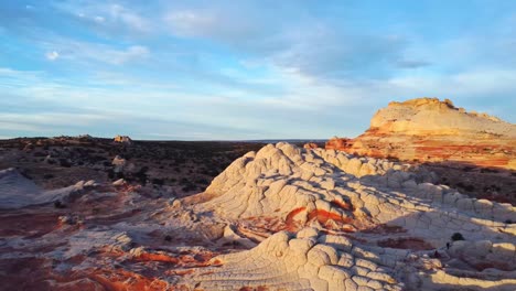 Picturesque-rocky-valley-with-cliffs-of-various-shapes-under-sunset-sky