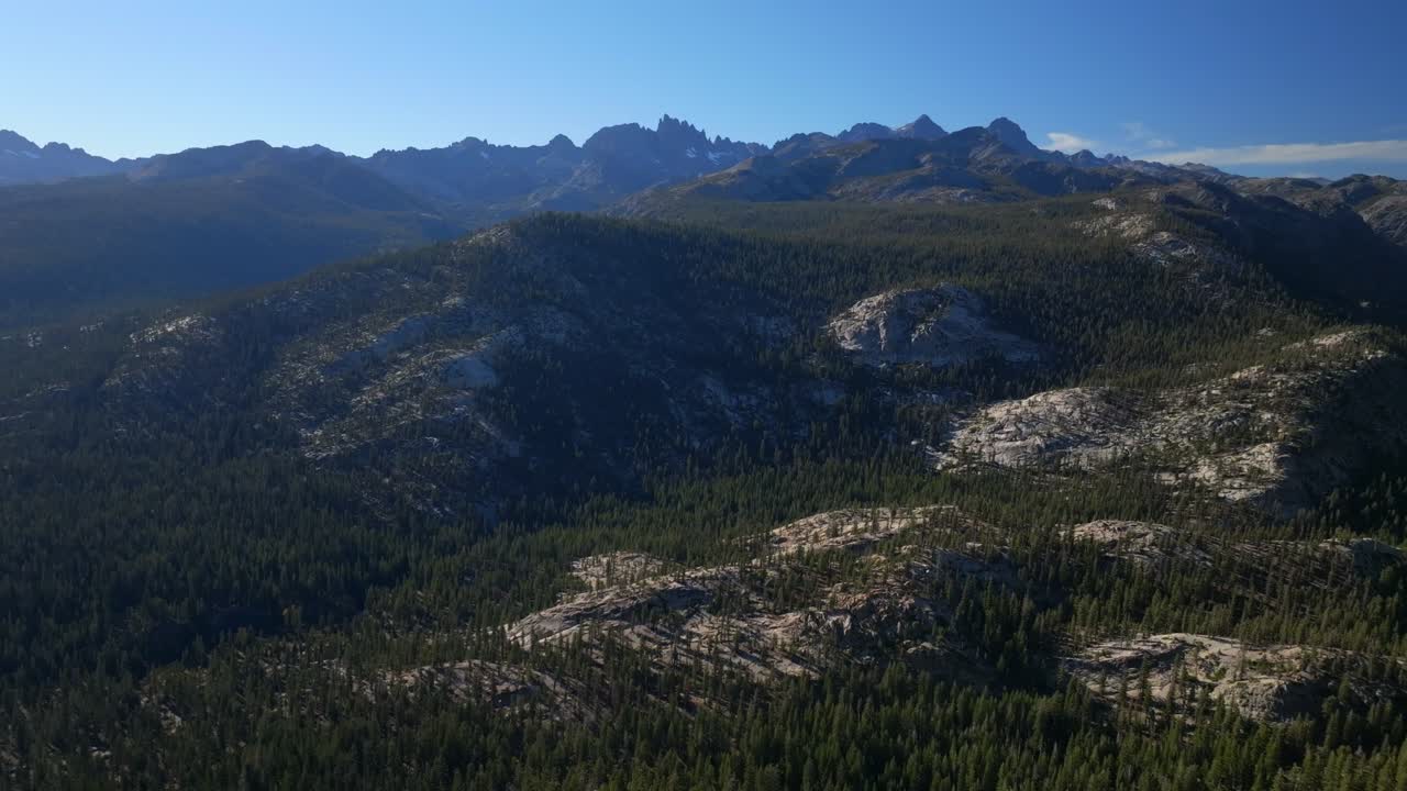 Minarets Vista Banner Peak Mammoth Mountain Lakes Sierras PCT Trail aerial drone California daytime morning afternoon blue sky clouds nature landscape Pacific Crest Trail Ridge forward pan up motion