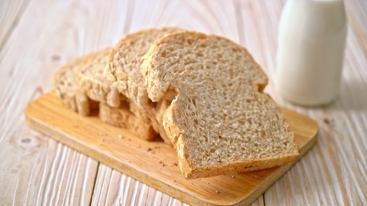 sliced wholegrain bread on a wooden table