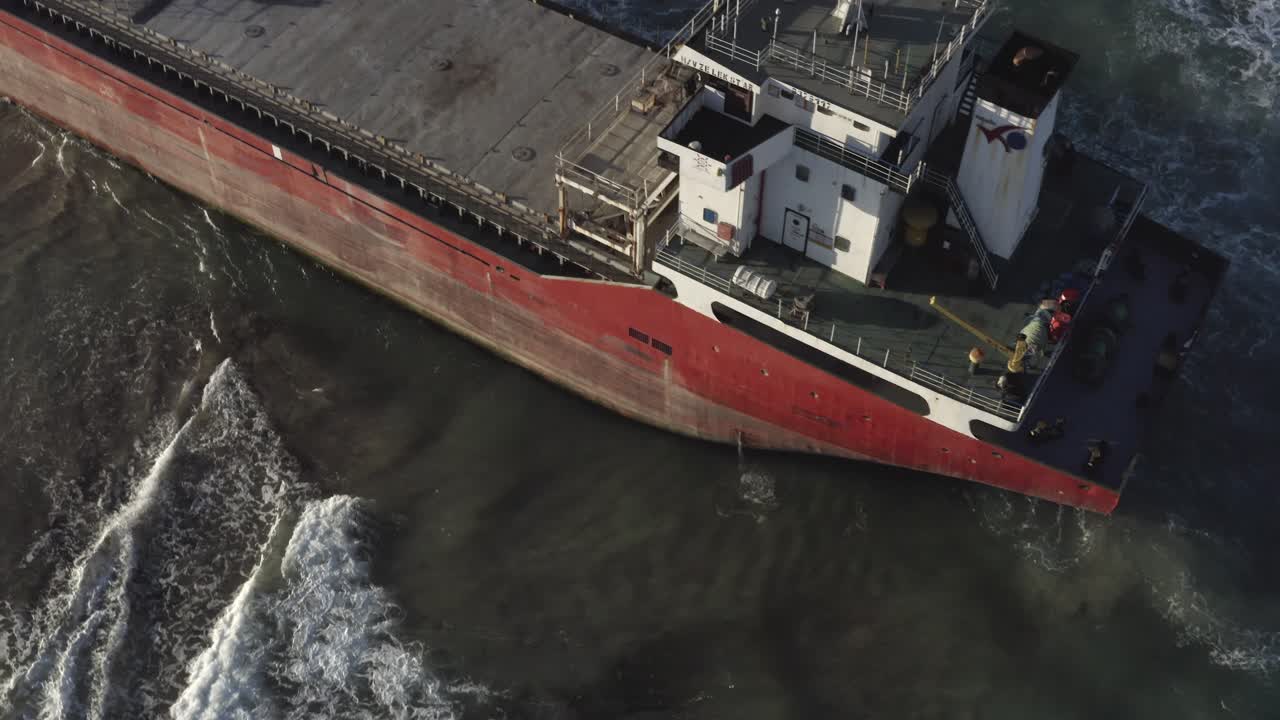 Damaged Cargo Ship Stranded on Beach