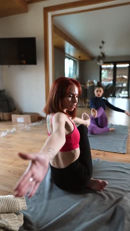 women practicing yoga at home