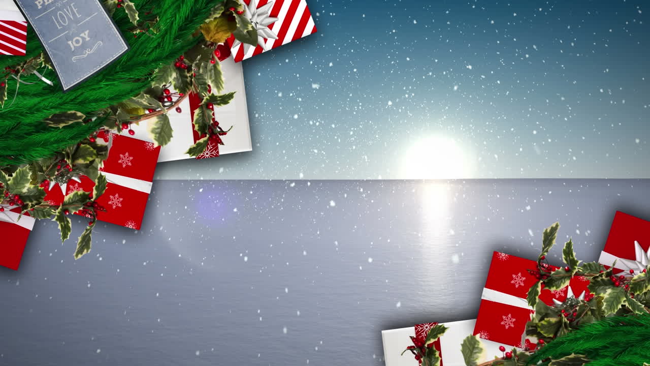animación de regalos y nieve cayendo sobre el paisaje de invierno