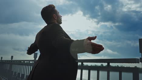 man enjoying the outdoors on a cloudy day