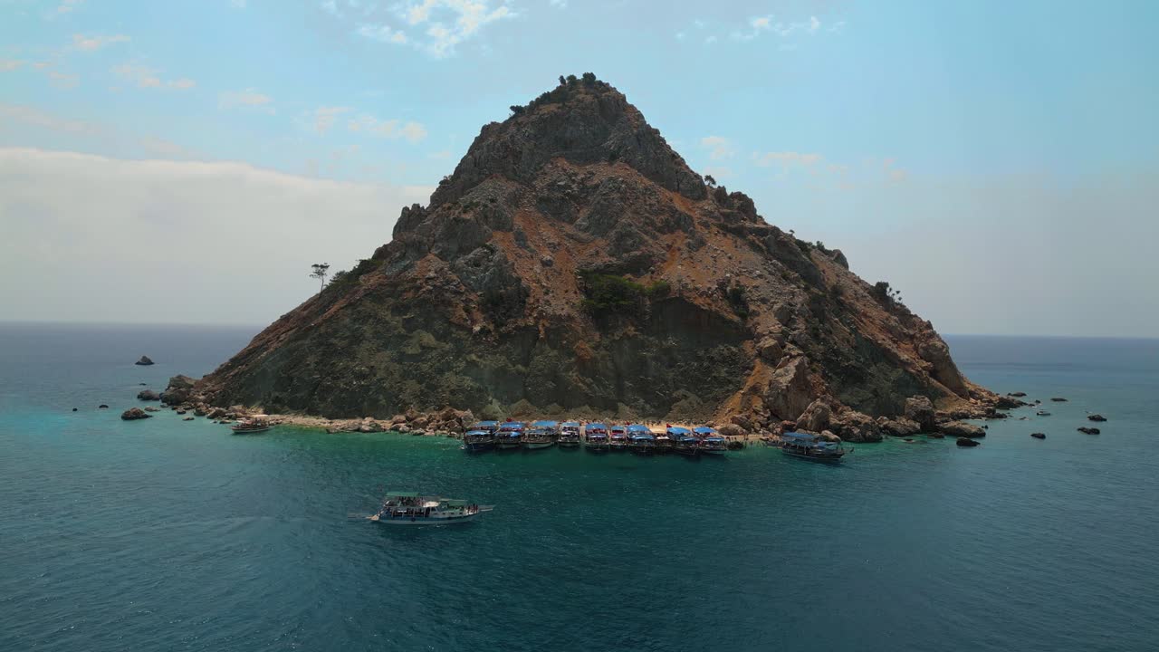 Stunning aerial footage captured by drone showcasing the crystal-clear turquoise waters and white sand beaches of Suluada Island - 4K Cinematic Drone Footage - Suluada - Turkey_08