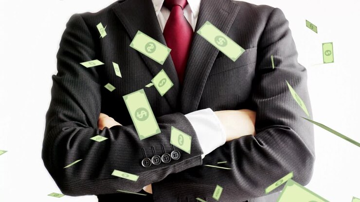 Businessmen and money flying in the air.