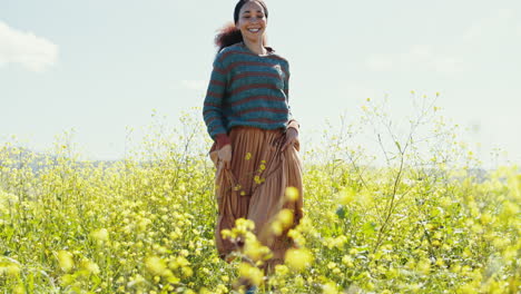 Woman-in-field-of-flowers-with-smile