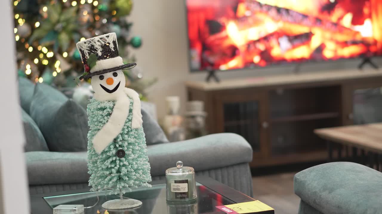 Cozy Christmas Living Room with Snowman Decoration and Fireplace TV