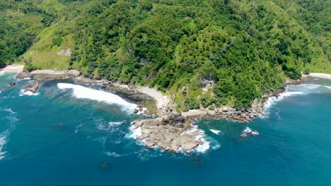 Scenic-unspoiled-tropical-Javanese-coast-Wonosari-Indonesia,-aerial-panorama