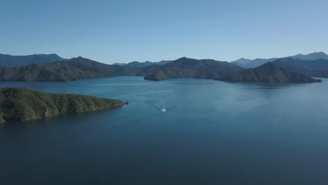 Speedboat-in-Picton,-New-Zealand-on-a-blue-sky-summers-day