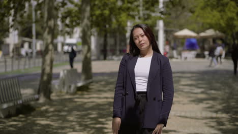beautiful asian girl posing in park