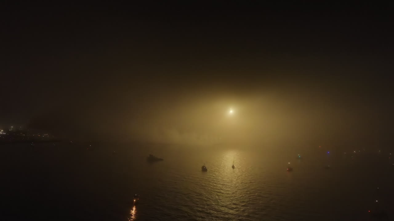 Fireworks above San Francisco bay at night