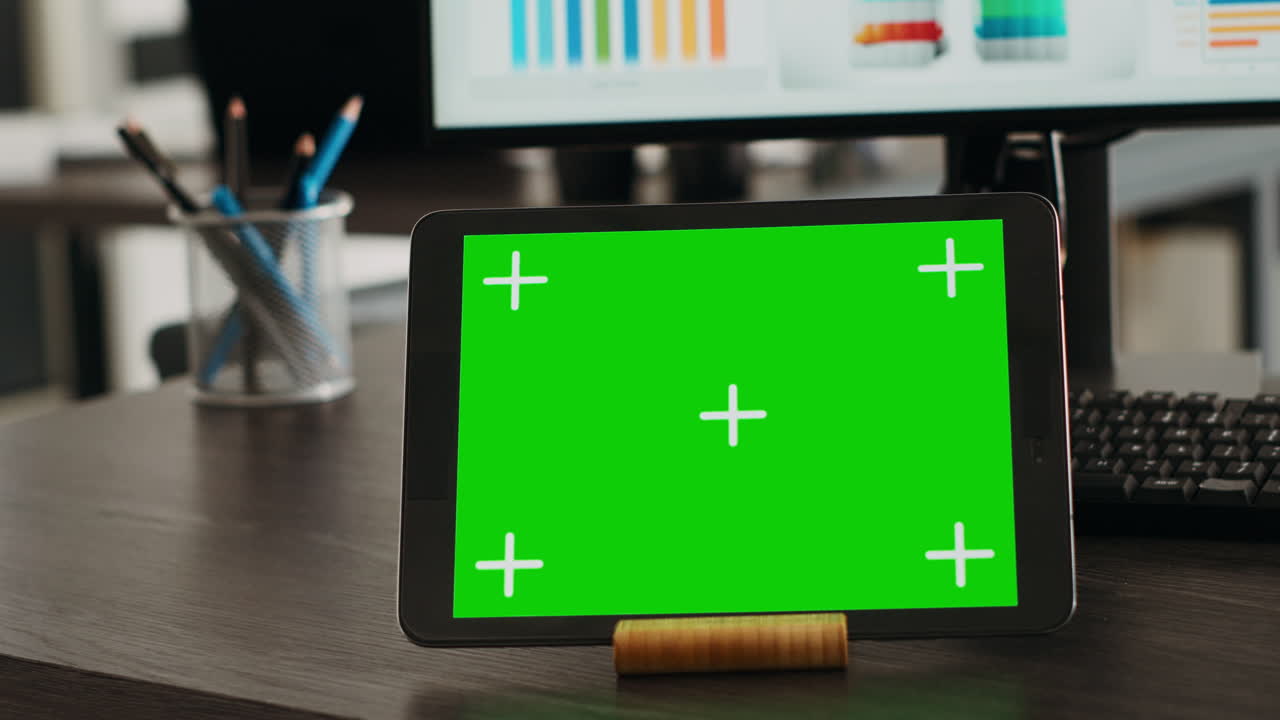 Digital tablet presenting greenscreen