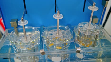 Experiments with tablets in the lab. Medical pharmacology laboratory for chemical analysis reactor.