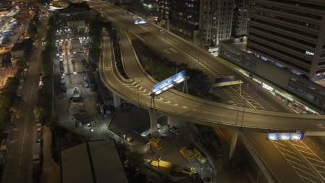 aerial panning shot of highway network in the urban development sai wan area in hong kong