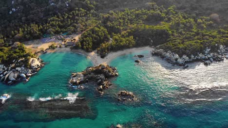 aerial view of turquoise sea, beaches and the coastline of tayrona, colombia - tracking, drone shot