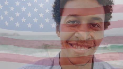 animación de un feliz hombre biracial sobre la bandera de los estados unidos