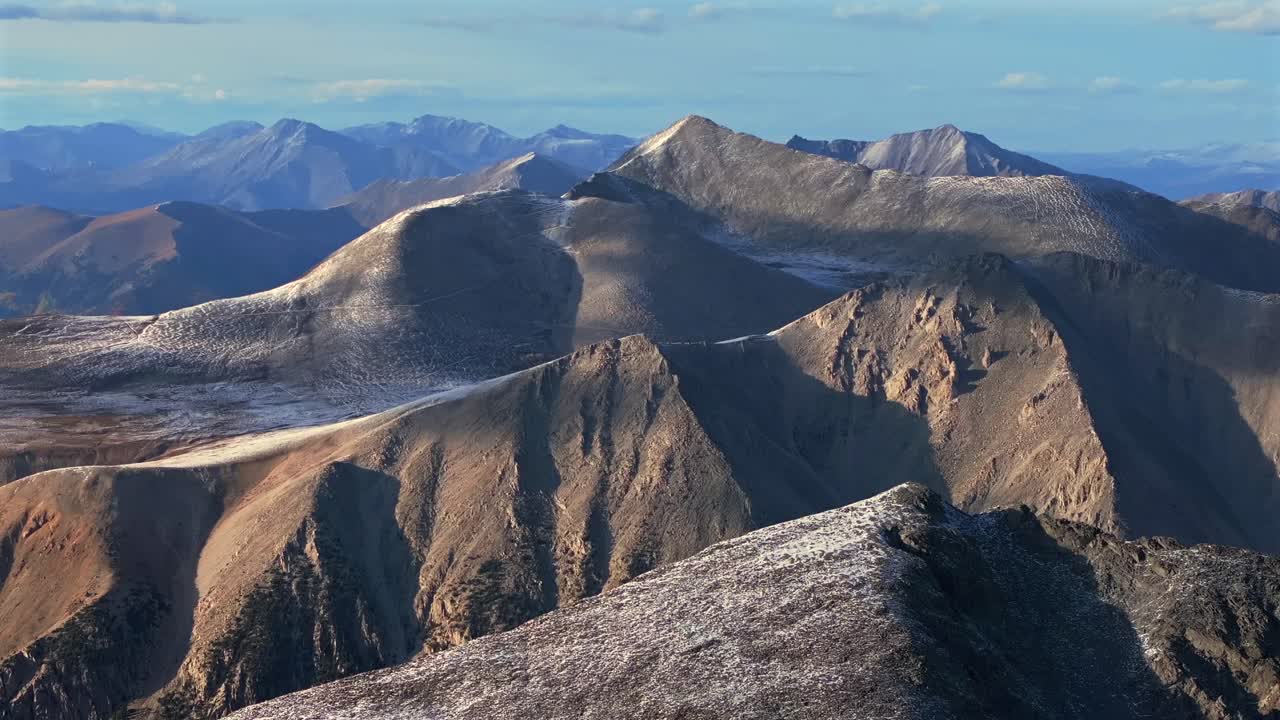 Mount Elbert Massive Mt Mount Shavano Taeguache Peak aerial drone Colorado Collegiate Peaks golden hour Rocky Mountains snow dusting 14er Buena Vista Sawatch Range above treeline fall autumn forward