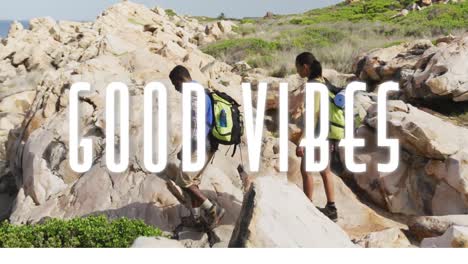 animation of the words good vibes written in white over couple hiking in mountains