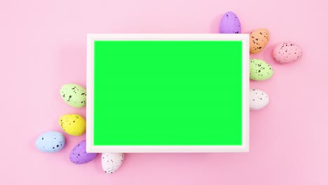 easter eggs and frame with green screen on pink theme. stop motion