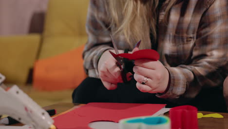 woman crafting hearts