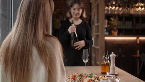a romantic dinner with pizza and champagne