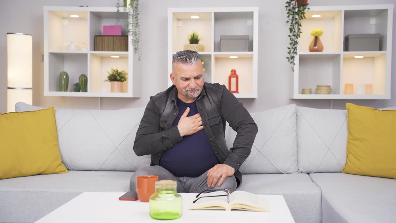 The sick old man can't stop coughing.