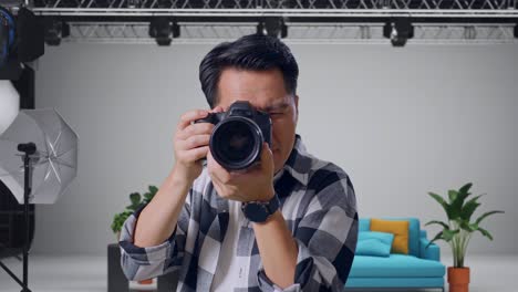 photographer taking photos in studio