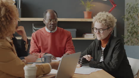 diverse team meeting in an office setting