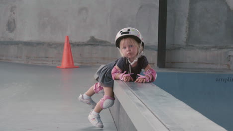 kids rollerblading in indoor skate park