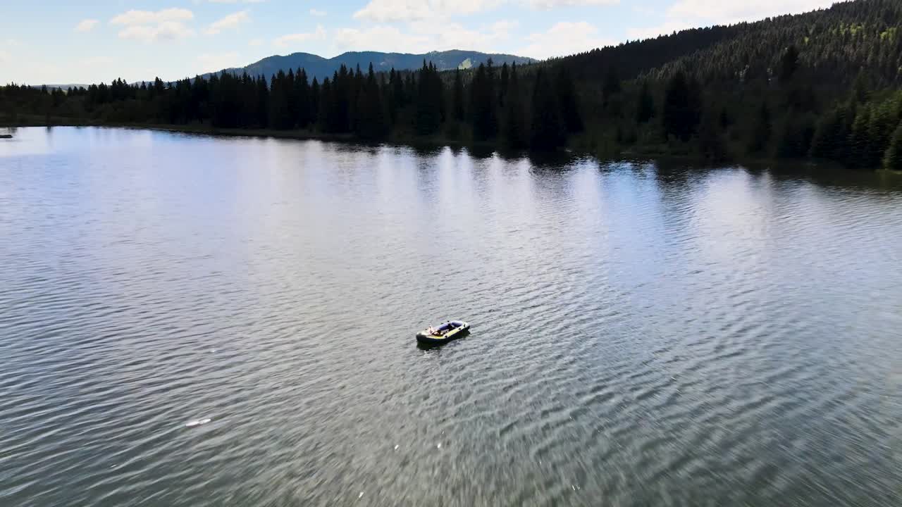 Raft in lake by the mountains