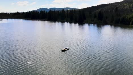 raft in lake by the mountains