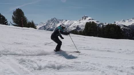 professional skier is showing awesome ski turns on point. super steady filming with the best mountain view in the alps. sixty pitucers