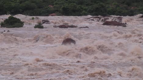 Heavy-flood-Water-flowing-in-the-flat-mountain-ranges