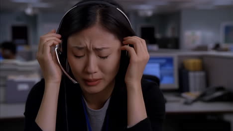 woman with headache or stress at work