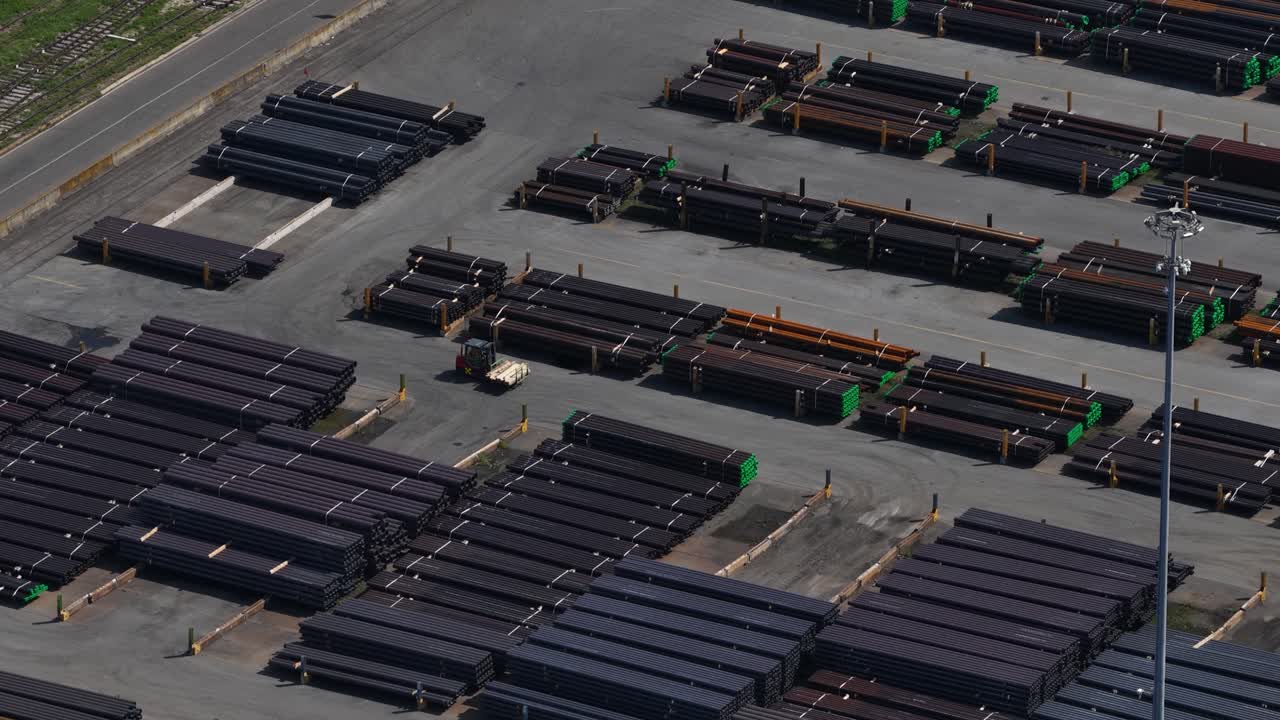 Industrial pipes manufacturing in Dalmine, Italy. Aerial drone video of factory grounds