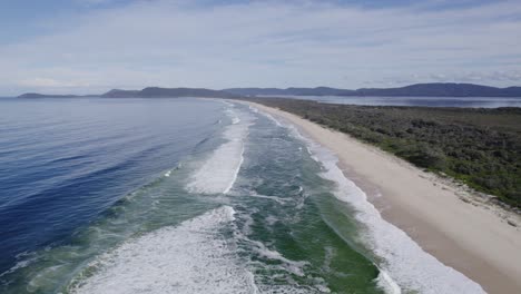 Idyllic-Ocean-Of-Seven-Mile-Beach-In-NSW,-Australia---aerial-drone-shot