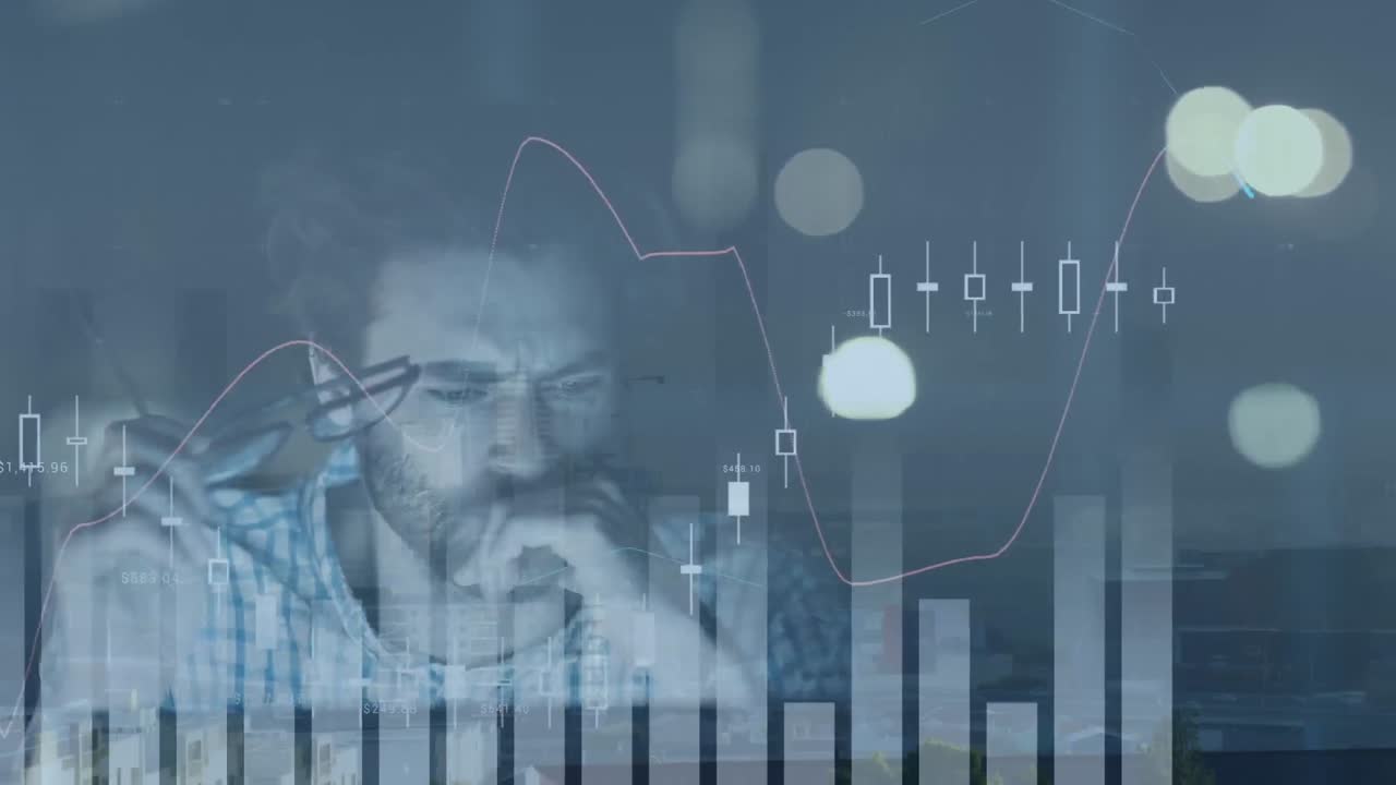 Animation of graphs and lens flare over caucasian businessman thinking and working late at night