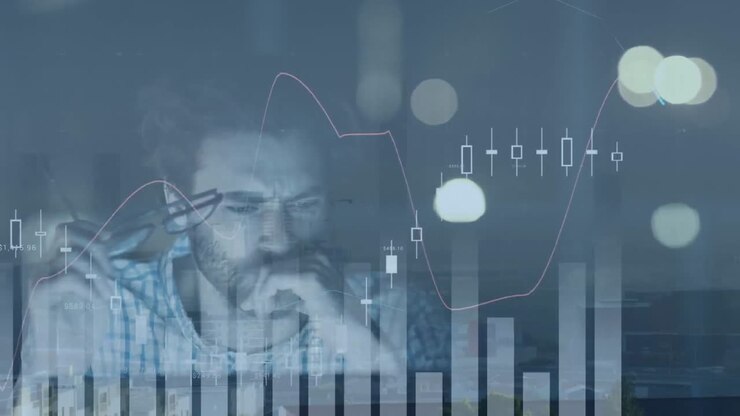 Animation of graphs and lens flare over caucasian businessman thinking and working late at night