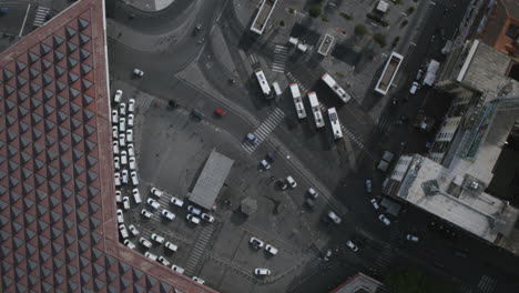 Static-overhead-aerial-hyperlapse-of-Napoli-Centrale-train-station-with-taxis-and-traffic